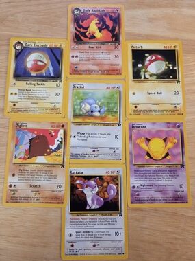 Assorted Team Rocket Era (2000) Pokemon Cards (Set of 7)